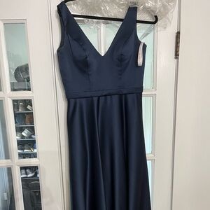 A-line V-Neck Floor-Length Satin navy blue Bridesmaid Dress with pockets.
